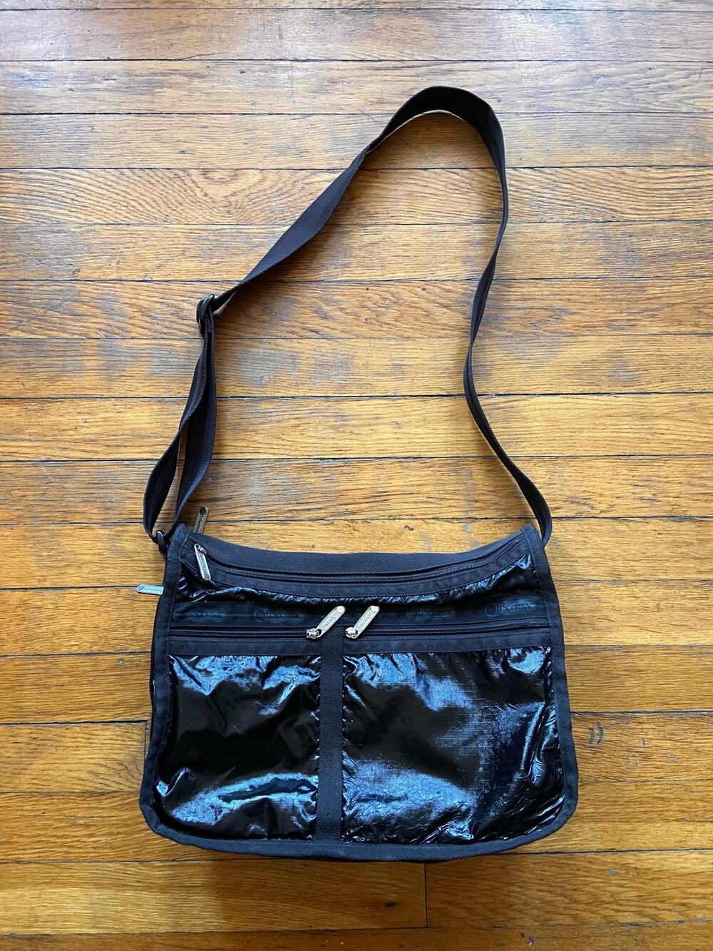 LESPORTSAC Expandable Black Crossbody Bag